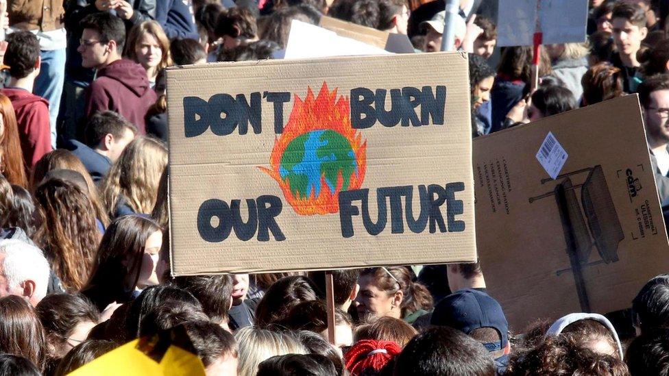 A banner seen at protests in Milan in Italy.