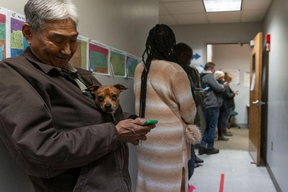 People line up to vote for the 2024 US Presidential Election on the last day of early and absentee voting, at Anchorage City Hall in Anchorage, Alaska, United States on 4 November 2024