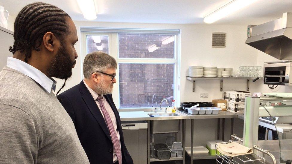 Two men in a kitchen