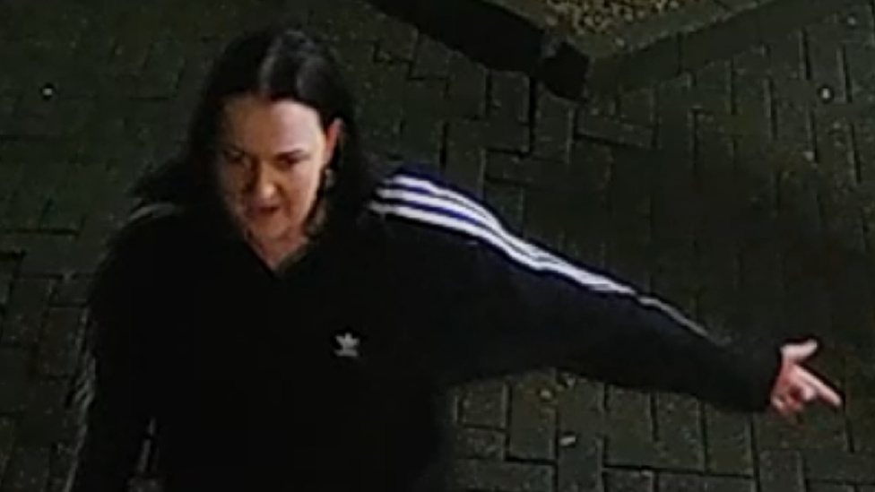 CCTV image of woman