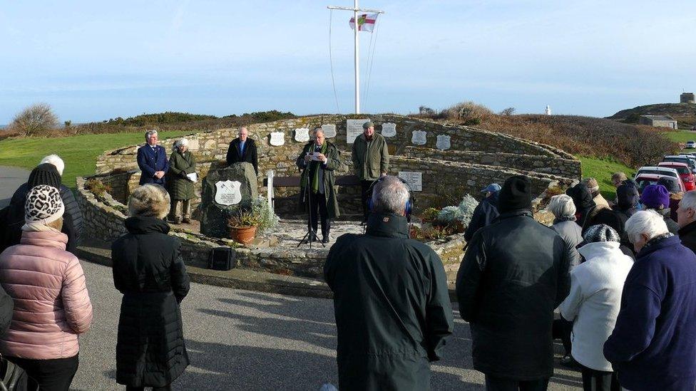 Community members at the memorial service