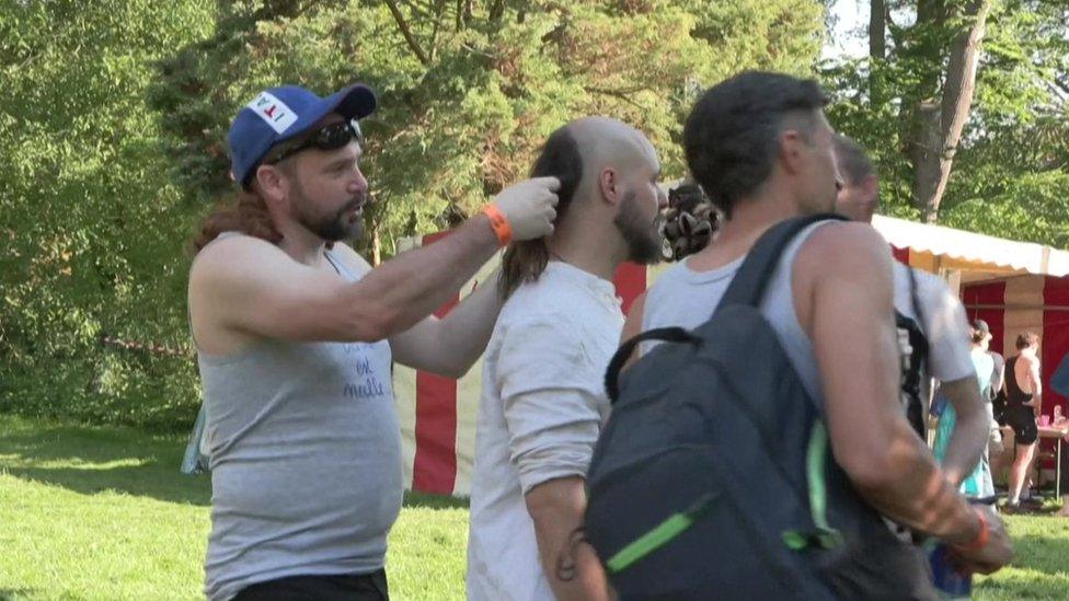 three men with different mullet styles