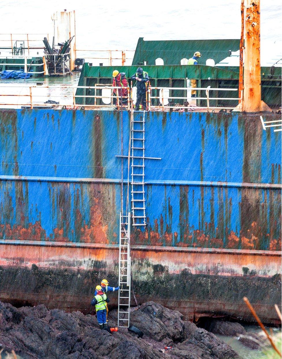 Personnel from Cork County Council board the wreck of the ghost ship