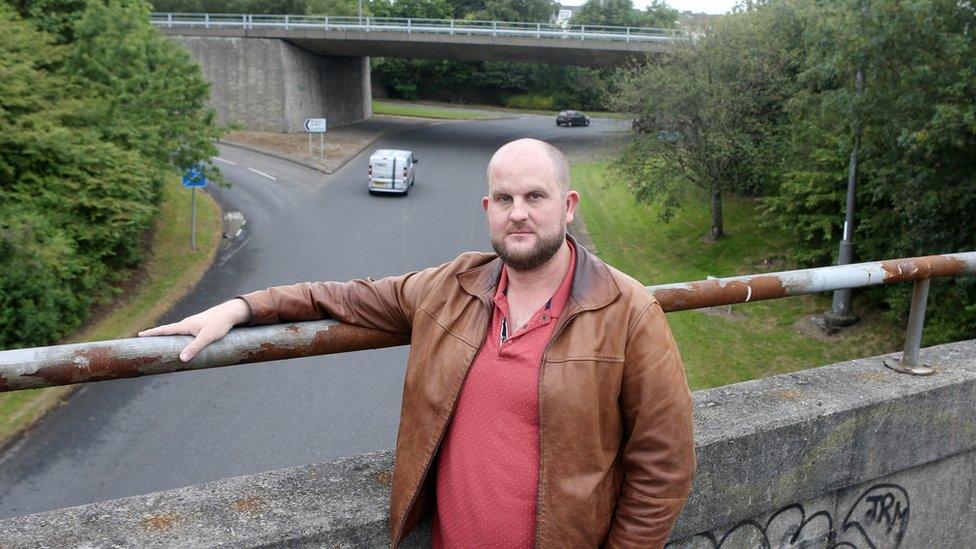 Rob Lawson standing near the Gateshead flyover