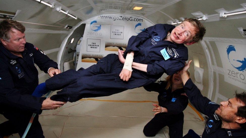 In this file photo taken on April 26, 2007 and released by Zero G, British cosmologist Stephen Hawking experiences zero gravity during a flight over the Atlantic Ocean. "It was amazing ... I could have gone on and on," Hawking, 65, said after riding for two hours on a modified jet.