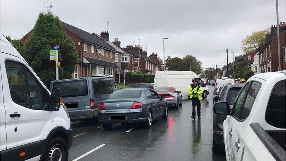 Police at funeral in Dunstable