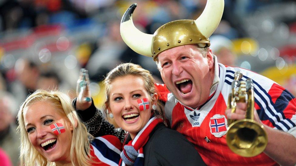 Happy Norwegian football fans watch the International Friendly match between Germany and Norway at the LTU Arena Duesseldorf on February 11, 2009 in Duesseldorf, Germany.