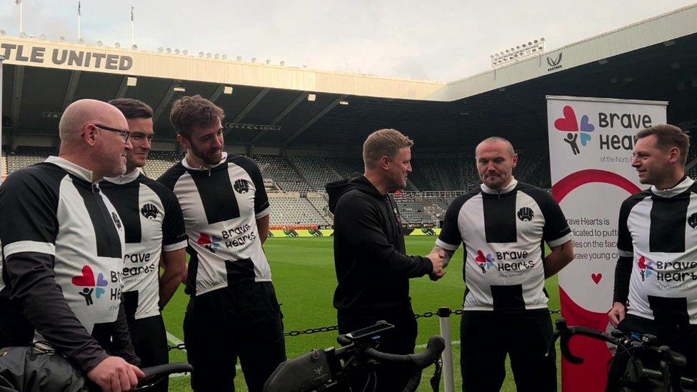 The cyclists with Eddie Howe