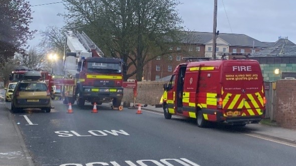 Emergency vehicles parked outside Wotton Lawn