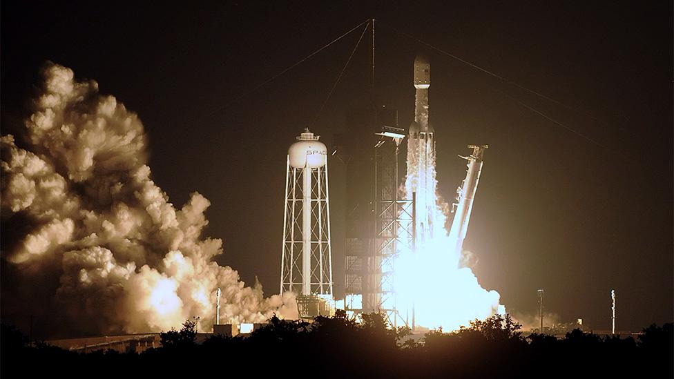 A SpaceX Falcon Heavy rocket carrying satellites for the US Air Force launches from Kennedy Space Centre in Florida, 2019