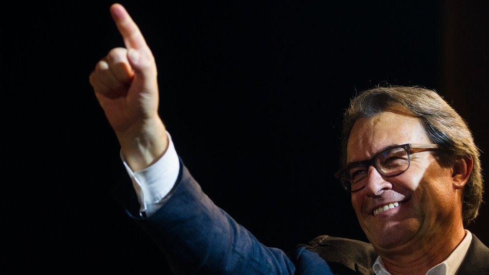 President of Catalonia Artur Mas waves at a rally, 27 September 2015