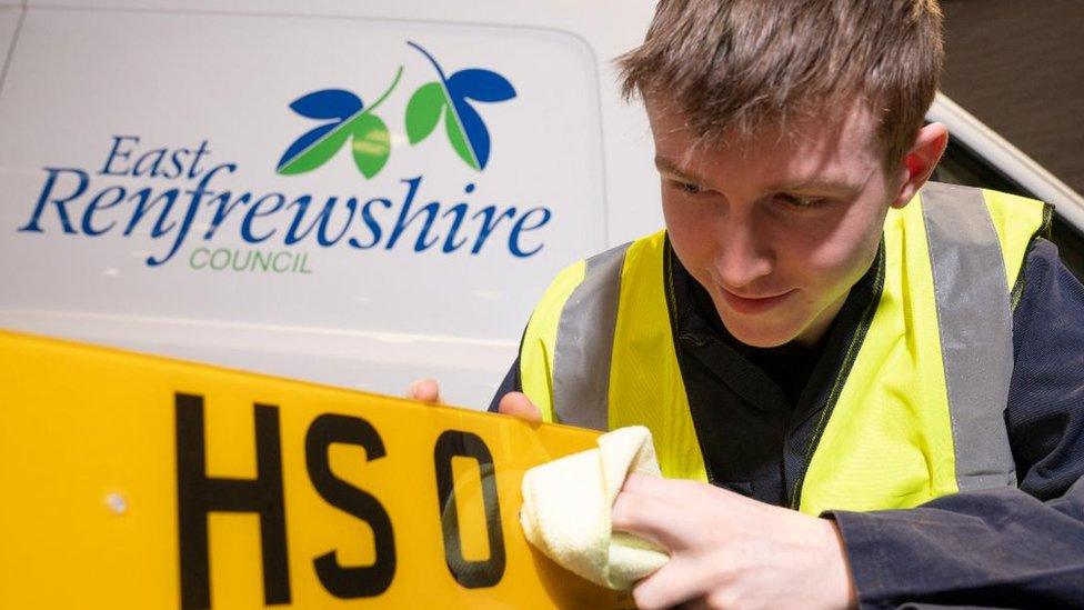 Council Trainee cleans number plate