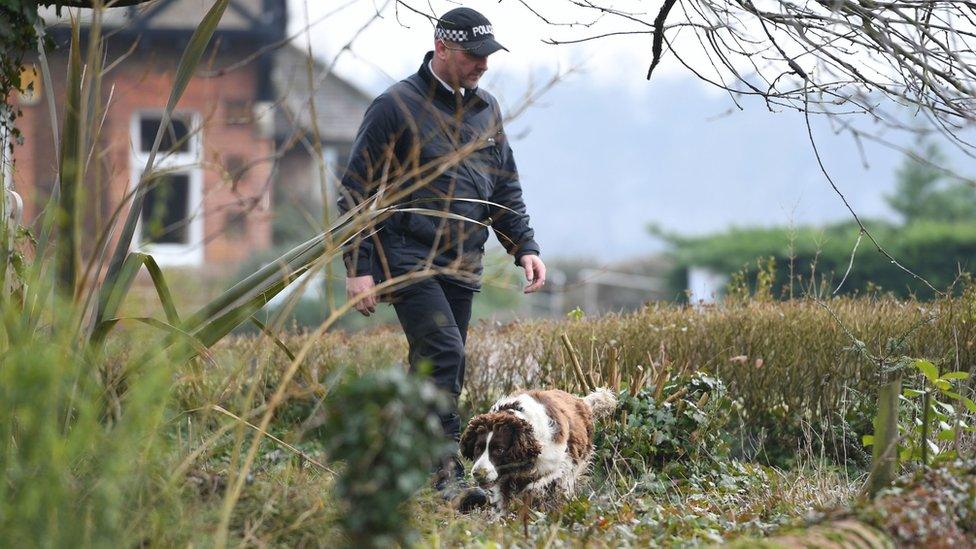 Police officer and dog at West Newton Village Hall