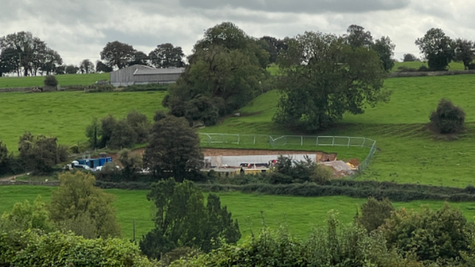 The hole that the developer has dug in Avening Court