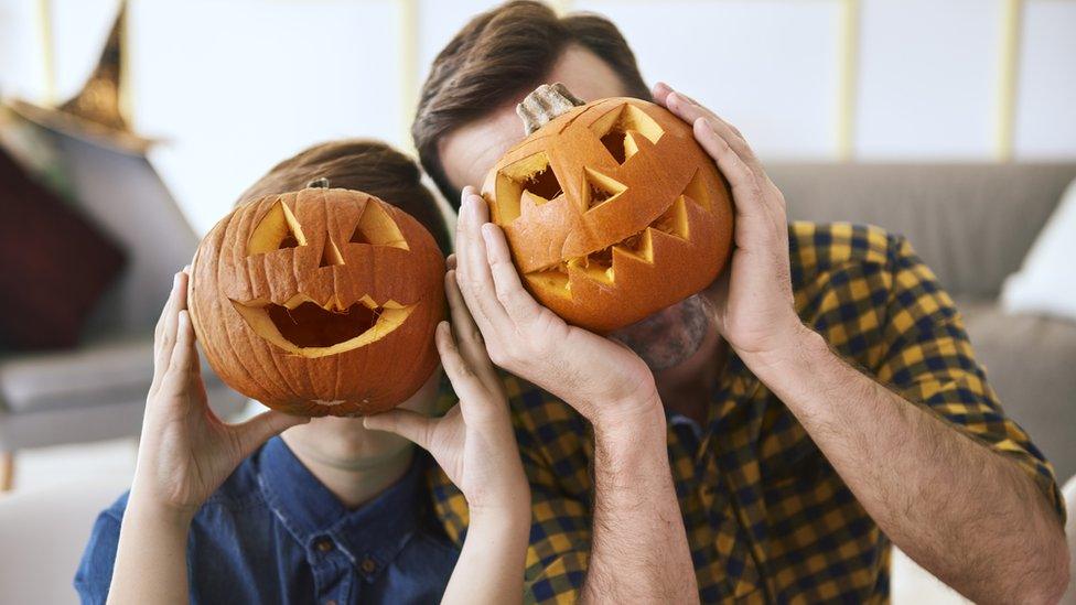 son-and-dad-with-pumpkins.