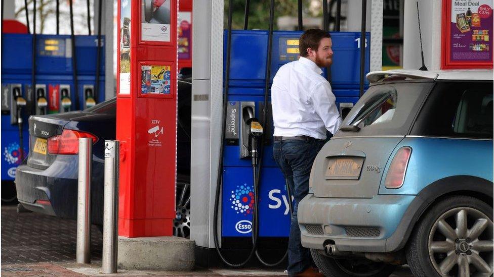 Man at petrol station