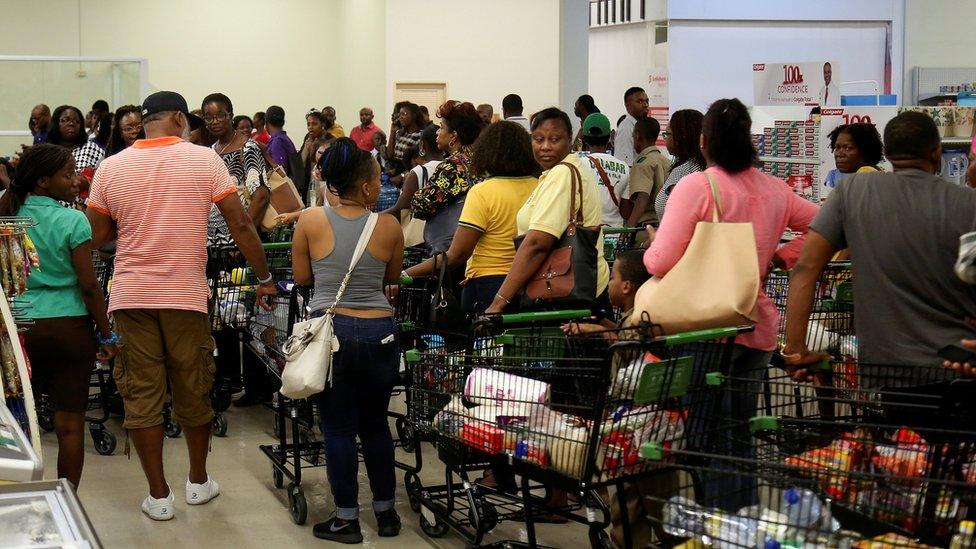 Long queue at supermarket checkout