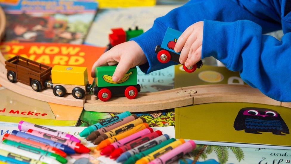 Child playing with toys