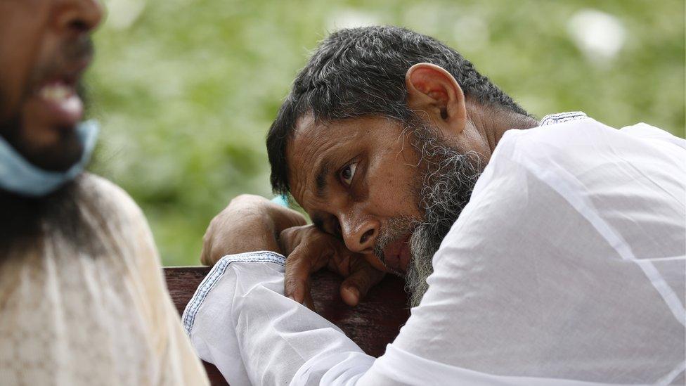 A man reacts during the rescue operation in the aftermath of a boat capsizing in the Buriganga river in Dhaka, Bangladesh, 29 June 2020.