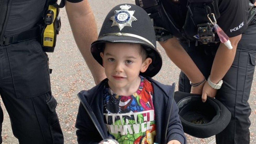 Jack wearing officers' hat