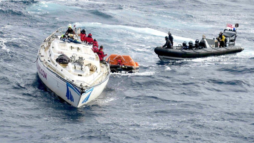 HMS Dragon crew recovering yacht crew