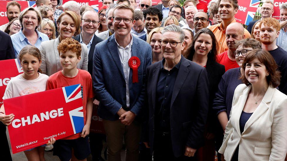  Labour Party leader Keir Starmer, flanked by Macclesfield candidate Tim Roca, attends a general election campaign event at the Vale Inn in Bollington