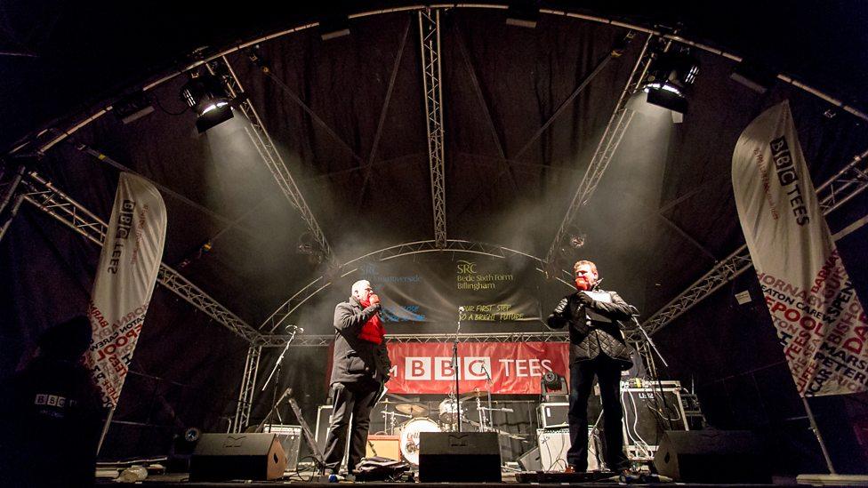 Ali Brownlee on stage at Stockton fireworks with fellow BBC Tees presenter Goffy