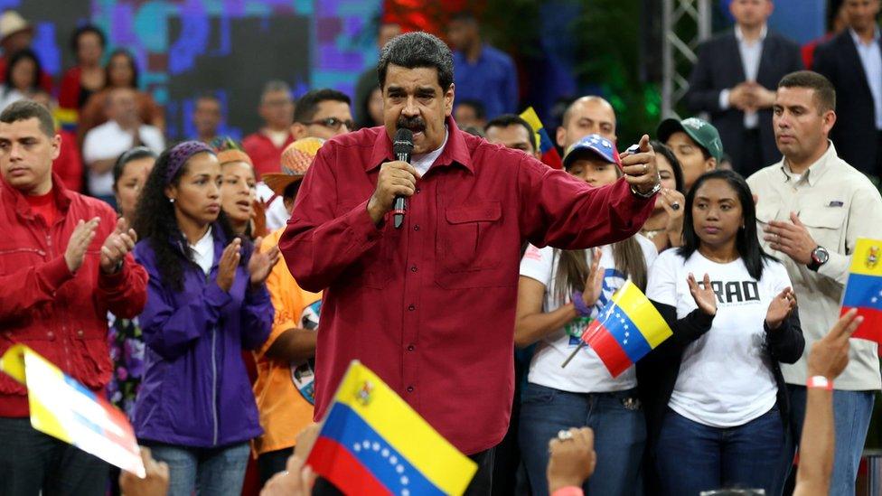 Handout photo shows Venezuelan President, Nicolas Maduro (C), during a rally of supporters in Caracas, Venezuela, 27 June 2017