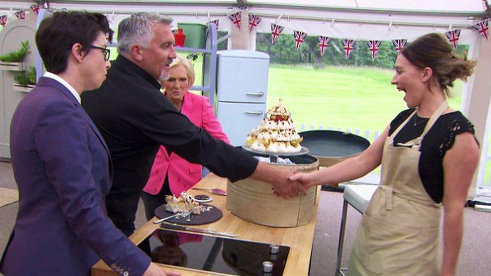 Paul Hollywood giving a handshake