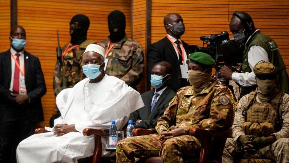 Transition Mali President Bah Ndaw (L) is seen with during his swearing-in ceremony at the CICB (Centre International de Conferences de Bamako) in Bamako on September 25, 2020.