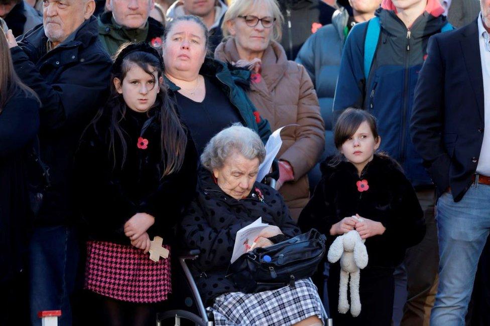 Members of the public observed the silence at the Scott Monument in Princes Street Gardens, Edinburgh