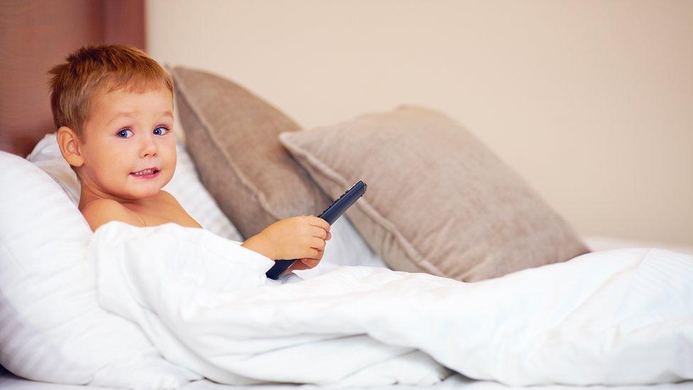 picture of child watching TV