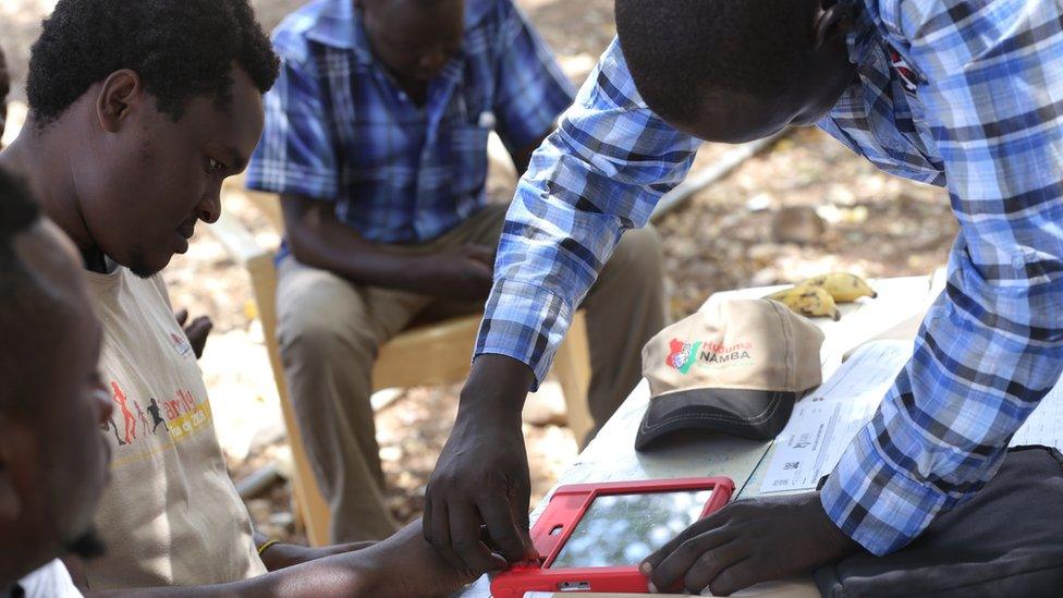 A person having their fingerprints taken as part of the Huduma Namba scheme last year