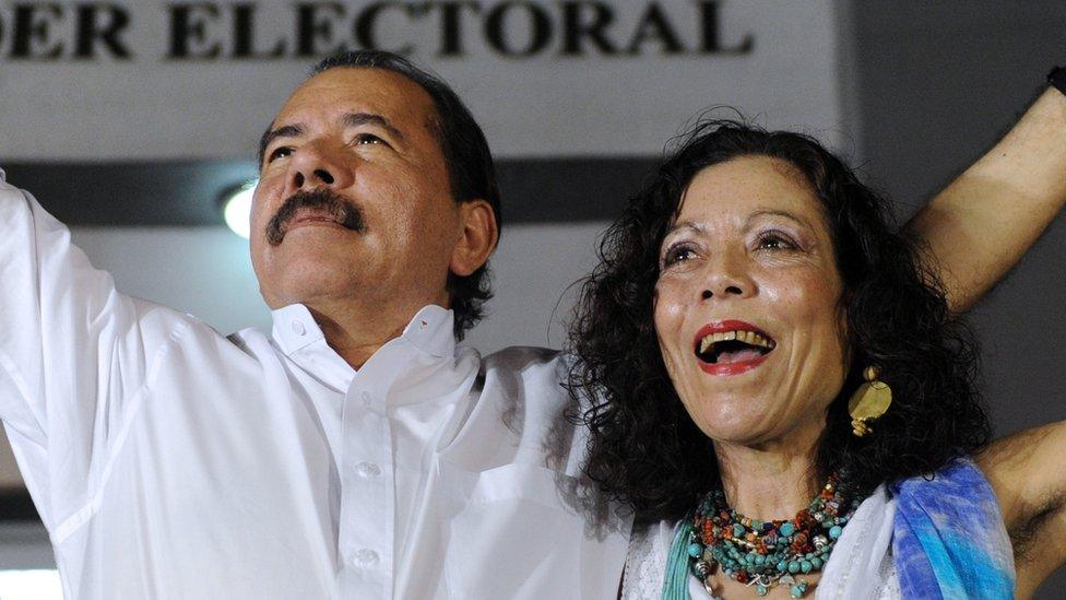 Nicaraguan President Daniel Ortega celebrates with First Lady Rosario Murillo after receiving the credentials in Managua on January 9, 2012, a day before his re-inauguration