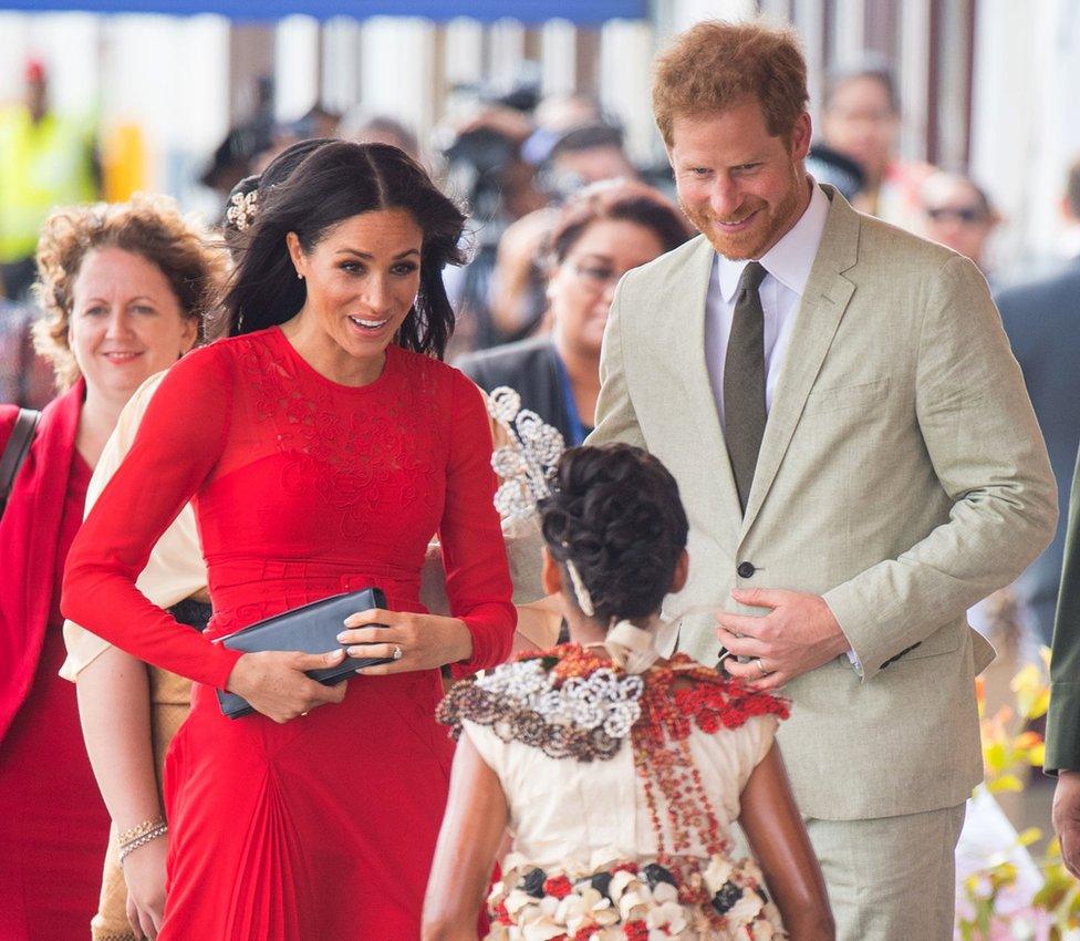 Prince Harry, Duke of Sussex, and Meghan, Duchess of Sussex, arrive at Fua'amotu Airport on 25 October 2018 in Nuku'Alofa, Tonga