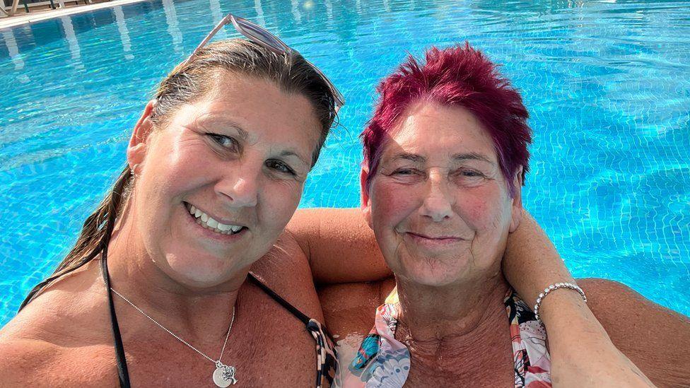 A selfie of Michelle Exton and her mother Ann in a swimming pool.