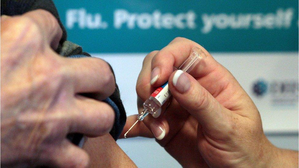 Person receiving a flu jab