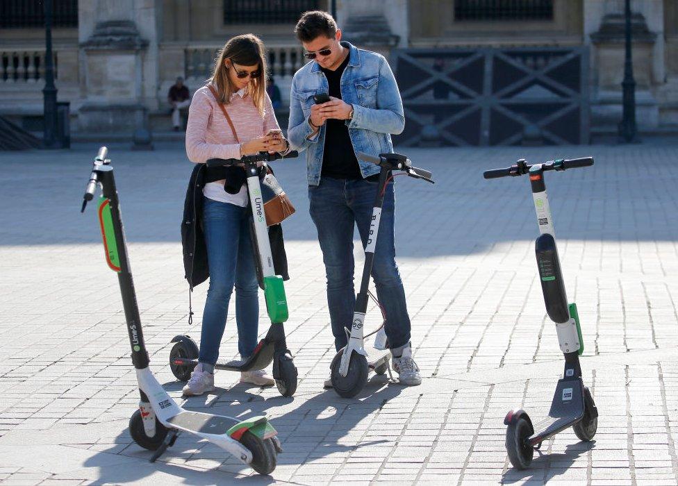 Lime and Bird scooters in Paris