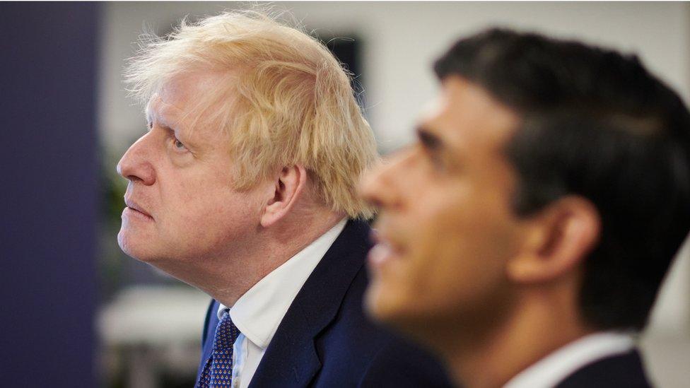 Prime Minister Boris Johnson and the then Chancellor of the Exchequer Rishi Sunak during a visit to the headquarters of Octopus Energy in London.