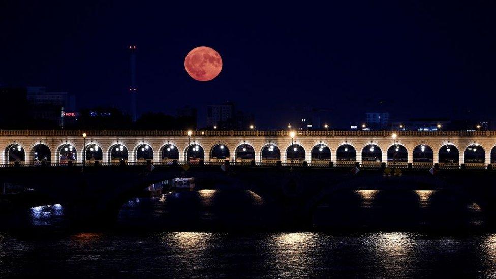 Buck Moon with Paris' 'Pont de Bercy' in the foreground