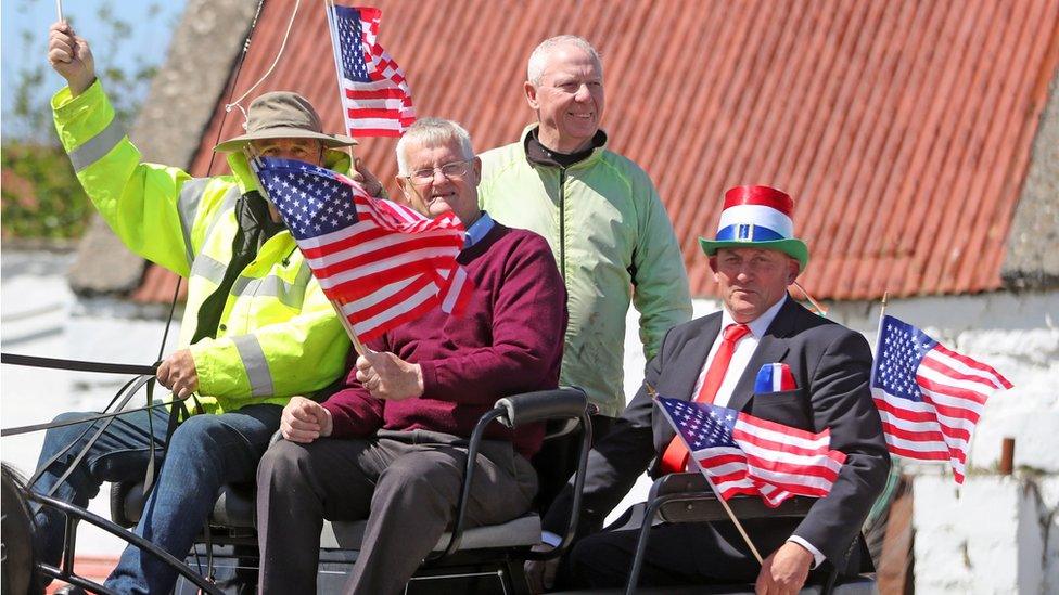 Some Doonbeg residents waved US flags to show their support for the president