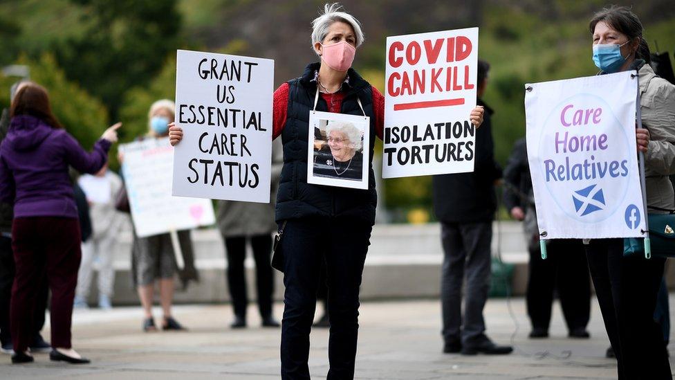 Relatives stage a demonstration over care home coronavirus visiting rules outside the Scottish Parliament on September 16, 2020 in Edinburgh, Scotland. Families gathered outside parliament to lobby MSPs, Care Home Relatives Scotland group wants to see more access for relatives in care homes to improve the quality of life for residents.