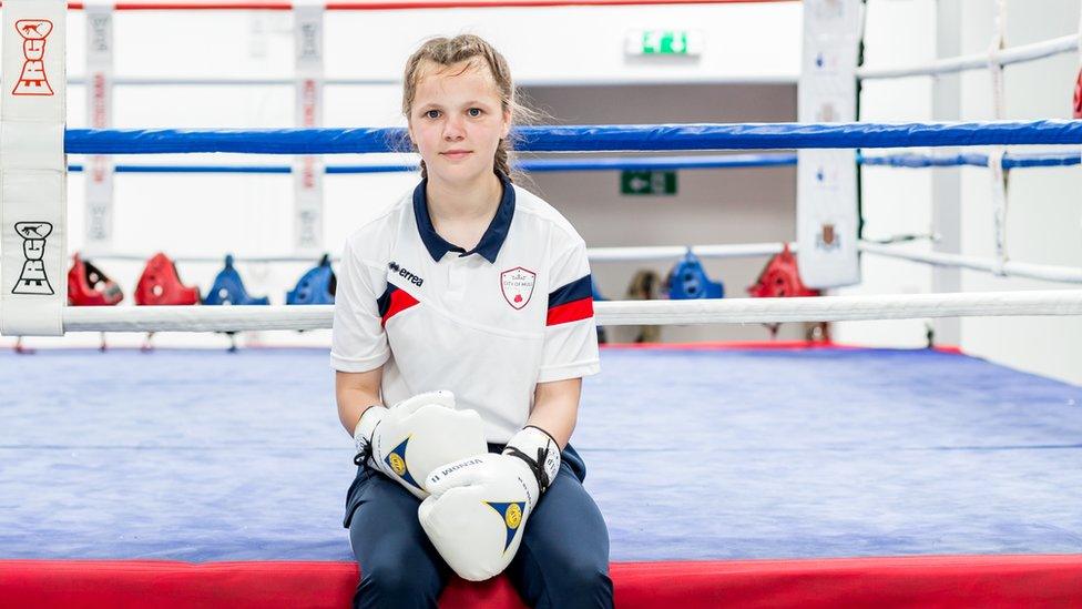 Sophie in a boxing ring