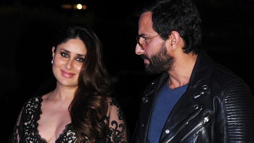 Indian Bollywood actors Saif Ali Khan (R) and Kareena Kapoor Khan pose for a photograph in Mumbai on December 5, 2016