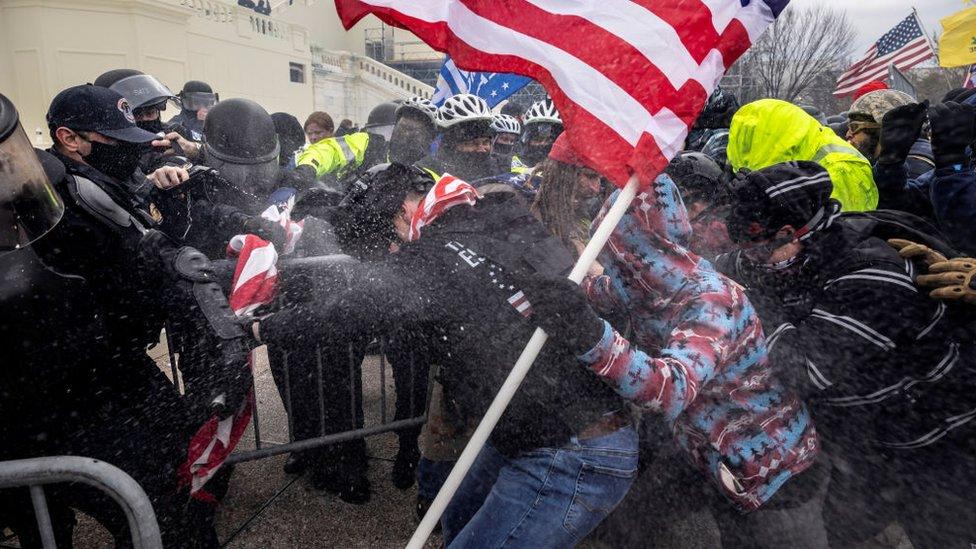 People storm the US Capitol on 6 January, 2021 in Washington, DC