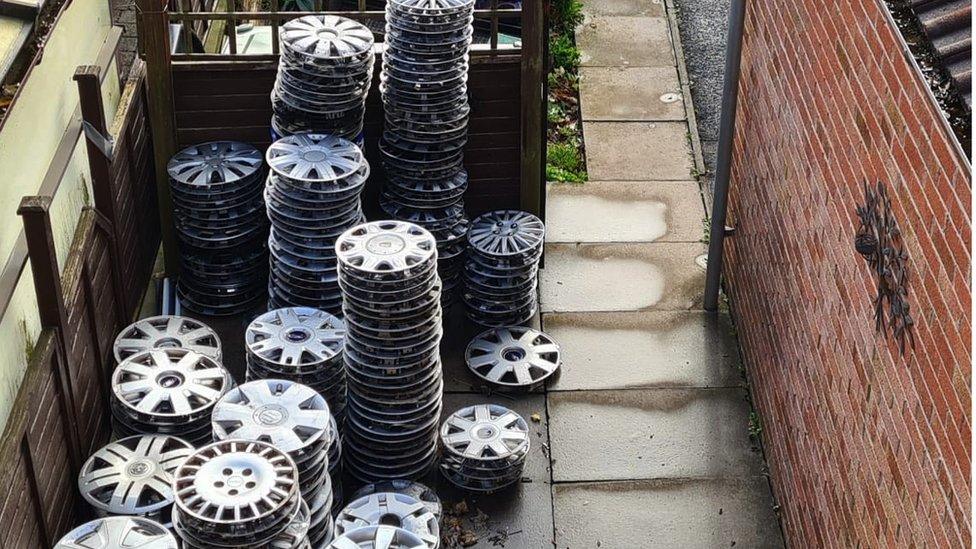 Hubcaps in the garden