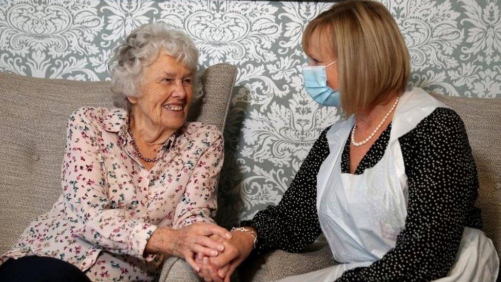 Care home resident with visitor