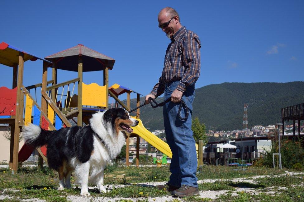 Luca de Paolis with his new dog Atos