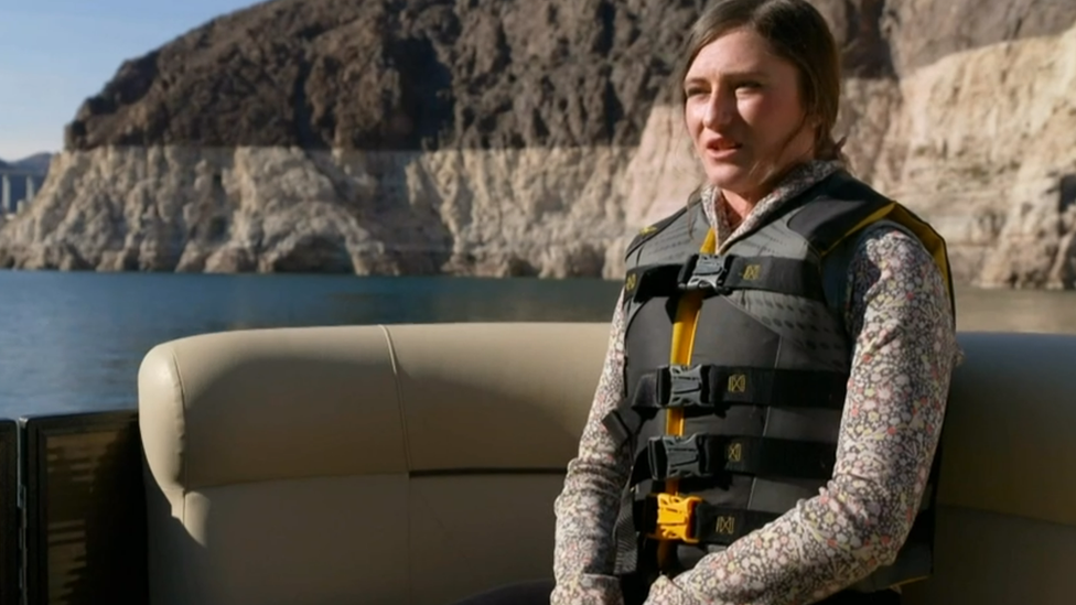 teal lehto in a boat in the colorado river