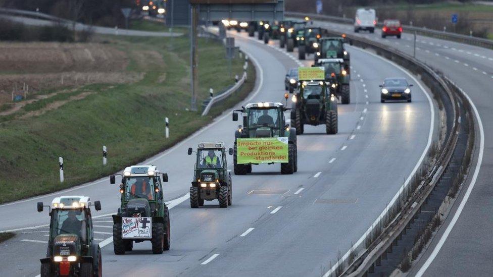 tractors on a highway